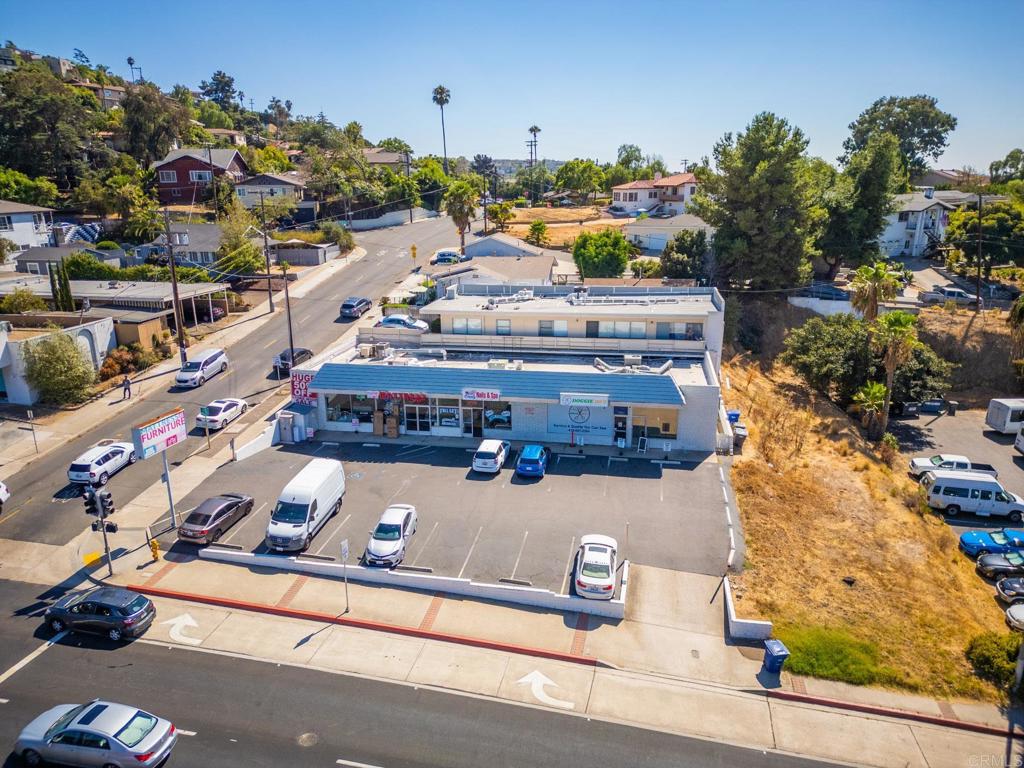 Alta Pacific Realty is please to offer this value-add MIXED USE property on the high traffic corner of La Mesa Blvd. and Normal Ave. at the main entrance to the Vons Shopping Center! With over 90' of frontage on the high traffic artery of La Mesa Blvd., between University Ave. and Spring Street, this property benefits from the community shopping center and MTS Trolley station 2/10ths of a mile away. Currently, rents are significantly below market offering a new buyer the potential to substantially increase income. The property includes 2 buildings, built in 1957 -- 3,840 s.f. of retail space comprised of three suites, with 2 on a month-to-month basis and the 3rd expiring soon. The Residential building, with frontage on Normal Ave. offers 1,850 s.f. -- a 2Br/2Ba with 1,225 s.f. and a 625 s.f. 1 Br/1Ba, both with Off Street Pkg, both on Mo. to Mo. agreements. The Retail Building features monument & building signage and 18 on-site parking spaces along La Mesa Blvd. Seller finacing may be considered.