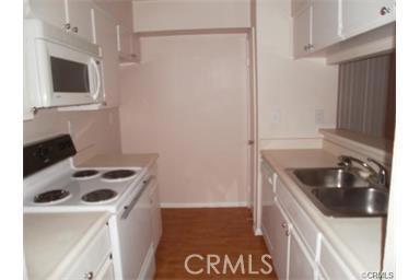 Spacious 1 bedroom, 1 bath, upper level condo. Kitchen with bar area overlooking living room, dining room, inside laundry room, lots of storage, large bedroom with dual closets and large balcony. New carpet and paint. Freeway and city close! A must see!