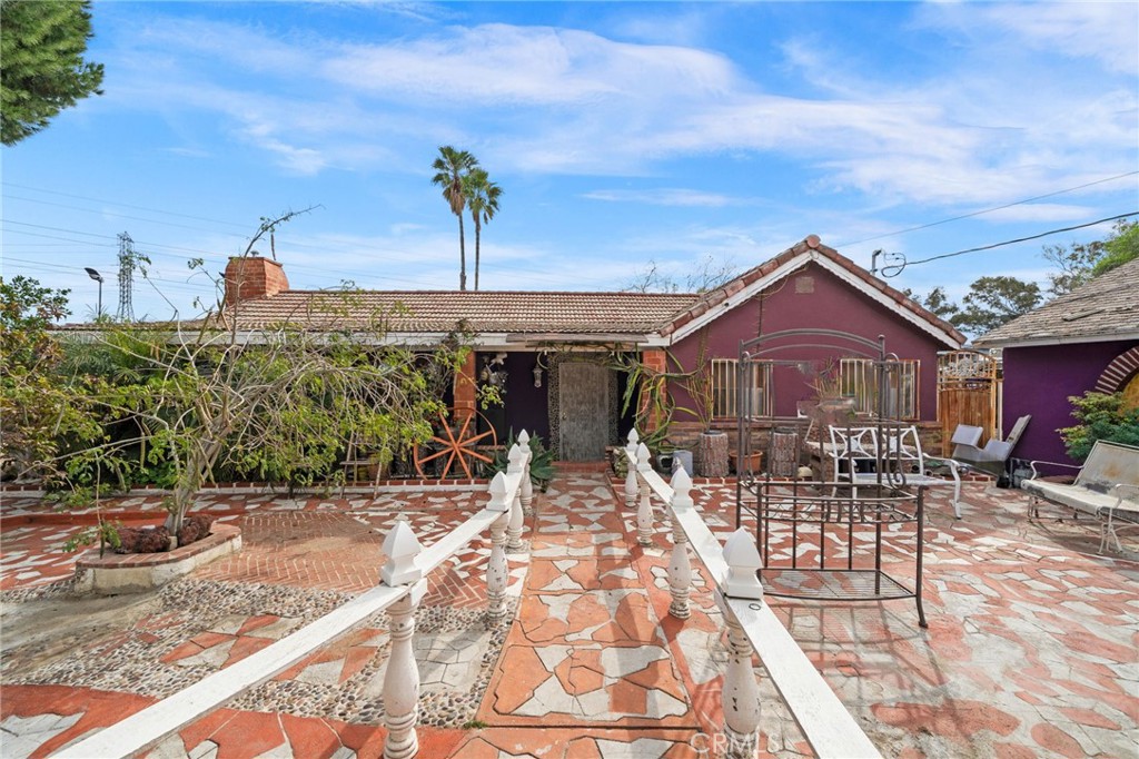 Welcome to your potential new home in the vibrant city of Bloomington! Nestled conveniently by the 10 freeway, this property offers a rare opportunity to own a spacious piece of land spanning almost 2 acres. As you step onto the grounds, you'll immediately notice the potential this property holds. The main residence boasts 4 bedrooms and 2 baths, providing ample space for comfortable living. Featuring a great-sized kitchen and living room, perfect to host family gatherings. Additionally, a detached 2-car garage offers convenience and storage options or even a great opportunity to turn it into an additional dueling unit. While this home requires some tender loving care, it presents an exciting canvas for customization and personalization to fit your unique vision. Whether you're a first-time homeowner looking to make your mark or an investor seeking an opportunity, this property invites you to unlock its full potential and create an oasis you've been dreaming of. Don't miss out on the chance to call this place your home sweet home!