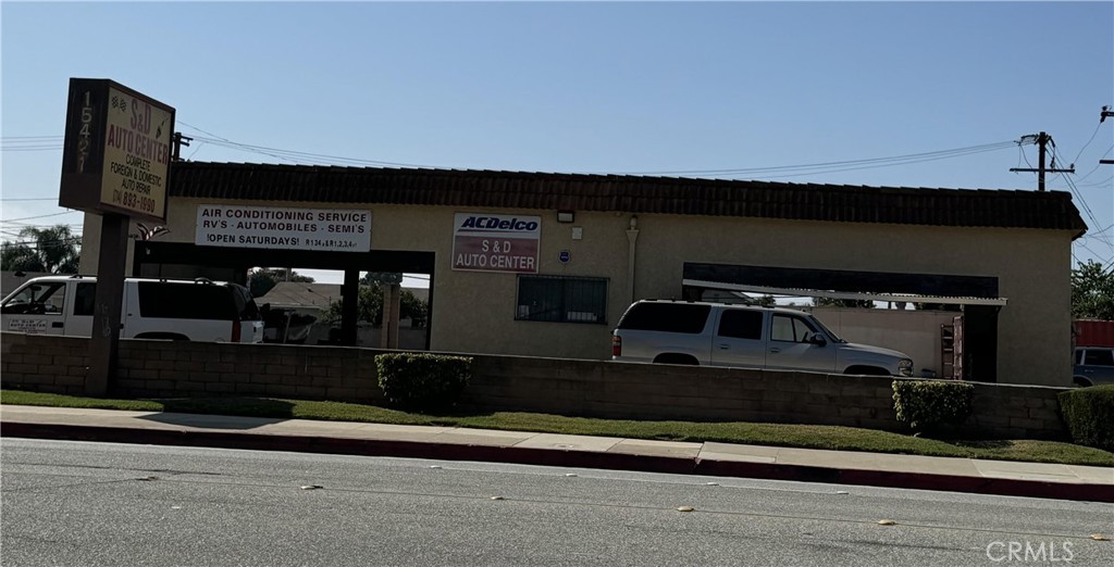Location, location, location! Huntington Beach location with lots of drive by traffic. Currently used as an auto repair shop with great street signage. 2 drive thru bays, lots of off street parking both front and back. Back lot also for lease for additional monthly rent. Easy access from both Edwards Street entrance and McFadden Ave entrance.