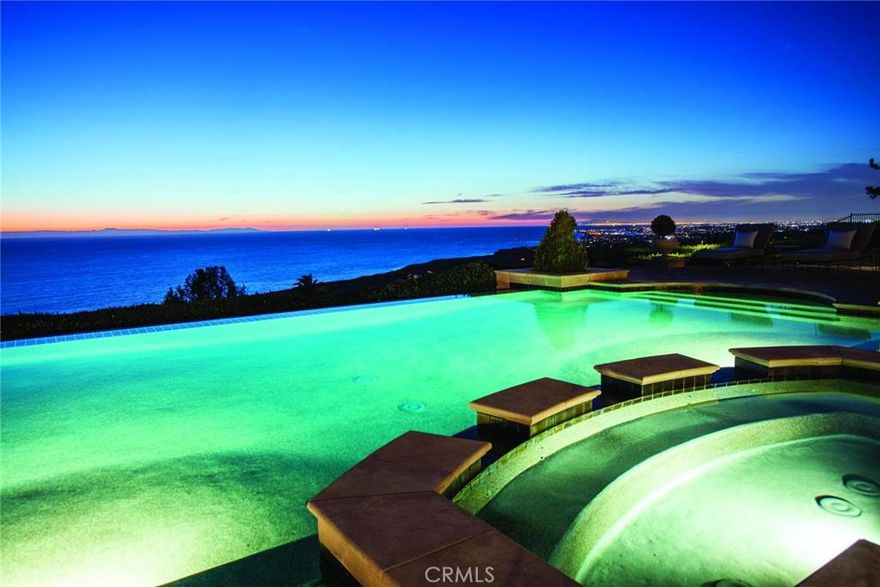 Gracing two premier lots in Crystal Cove, 8 Mystique is the finest property ever publicly offered in Newport Coast. Encompassing approximately 18,600 square feet of living space and nearly 37,000 square feet of resort-quality grounds, this estate offers an unprecedented level of luxury living with every amenity imaginable. Included in a long list of awe-inspiring features are: Ocean views from every major room above ground, on-grade & subterranean garages for 10 cars, gym with shower and steam room, a 16-seat theater, a dedicated sports pub area, a refrigerated wine room with storage for 1,200 bottles, and a commercial style elevator. Aside from the infinite array of creature comforts, 8 Mystique exudes elegance exquisitely exhibited in the artistry of every surface, of every room, many of which are appointed with reclaimed antique fireplaces. There is much to explore and admire in this flawless estate; you will discover what luxury living in Southern California truly means.