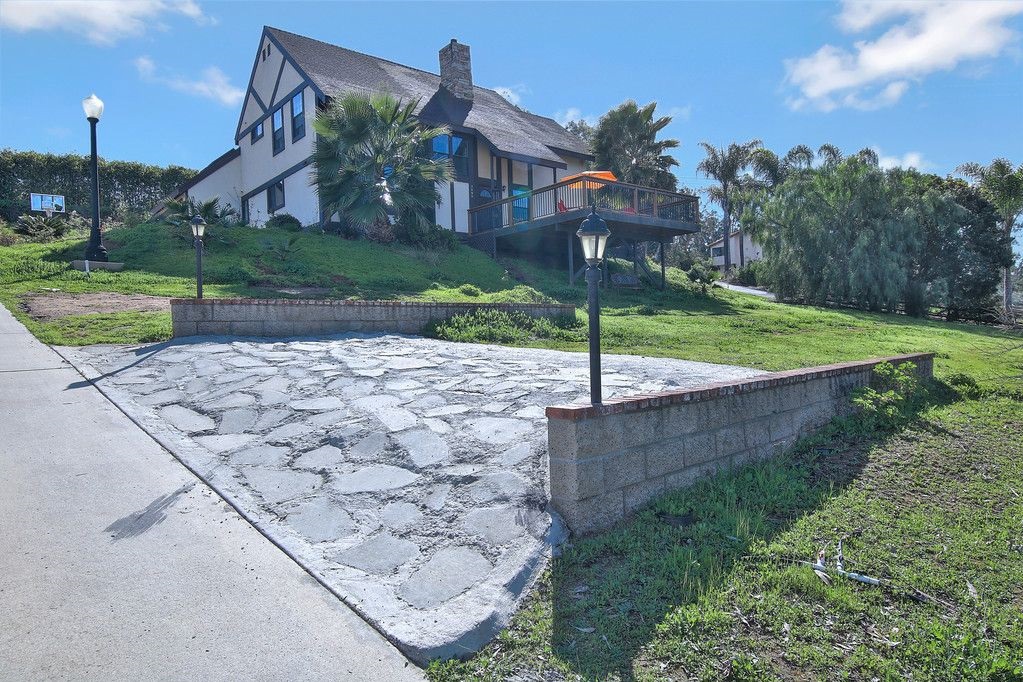 This gorgeous 2-story French Country style home is in a peaceful and scenic neighborhood in Fallbrook. This home features a living room with high beamed ceilings and plenty of natural light. The kitchen is updated with black granite countertops and stainless steel appliances. The main floor has a spacious master suite with walk-in closet. The second story features two bedrooms, a jack-and-Jill bathroom and a large bonus room (not included in square footage) to use as a 4th bedroom, office, playroom. Neighborhoods: Via Monserate Equipment: Garage Door Opener, Range/Oven Other Fees: 10 Sewer: Septic Installed Topography: SSLP