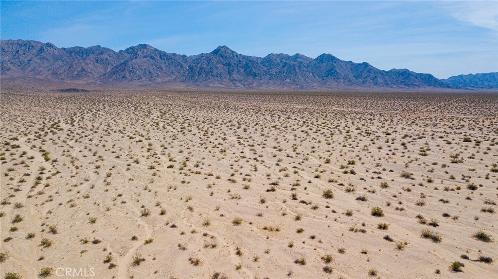 Discover the beauty and tranquility of Wonder Valley with this exceptional 80-acre parcel, perfectly situated with government land on two sides. This unique property offers a blend of privacy, stunning desert landscapes, and limitless potential for various uses. Whether you envision a serene desert retreat, an off-grid homestead, or a smart investment, this land promises endless opportunities.
KEY FEATURES:
Location: Wonder Valley, California
Size: 80 acres
Surroundings: Adjacent to government land on two sides, providing a sense of seclusion and protection from encroaching development
Terrain: A diverse mix of flat and gently rolling terrain, ideal for building, recreation, or agriculture
Accessibility: Accessible via well-maintained dirt roads, with easy access to Twentynine Palms and Joshua Tree National Park
Utilities: Perfect for off-grid living with ample space for solar and wind energy; water wells are common in the region.
Investment Potential: With increasing interest in desert living and its proximity to major attractions, this property is a valuable long-term investment
HIGHLIGHTS:
Privacy and Natural Beauty: Enjoy the serenity of a secluded location with no immediate neighbors on two sides, preserving your views and privacy.
Stunning Views: Experience panoramic vistas of the Mojave Desert, spectacular sunrises and sunsets, and crystal-clear night skies ideal for stargazing.
Proximity to Attractions: Just a short drive to the vibrant communities of Twentynine Palms and Joshua Tree, with their eclectic shops, restaurants, and cultural attractions. Easy access to Joshua Tree National Park offers endless outdoor adventures.
IDEAL FOR:
Nature enthusiasts and outdoor adventurers
Off-grid living and sustainable lifestyle seekers
Investors looking for unique, large-scale land opportunities
Artists and creatives inspired by the serene desert environment.
Don't miss this rare chance to own a substantial piece of desert paradise in Wonder Valley. Embrace the freedom and endless possibilities this 80-acre property offers. Act now to secure your slice of the California desert dream!