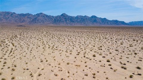 Photo of 504 Ironage Road, 29 Palms, CA 92277 (MLS # JT24108219)