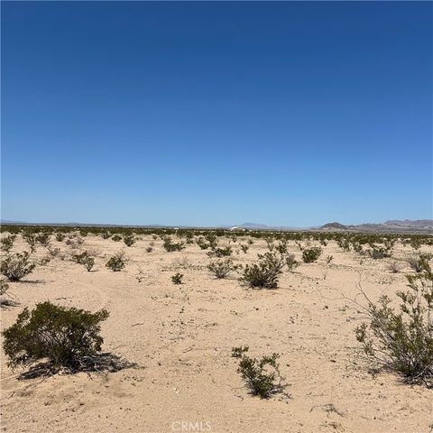 Photo of 1102 Samarkland Dr, 29 Palms, CA 92277 (MLS # JT24048752)