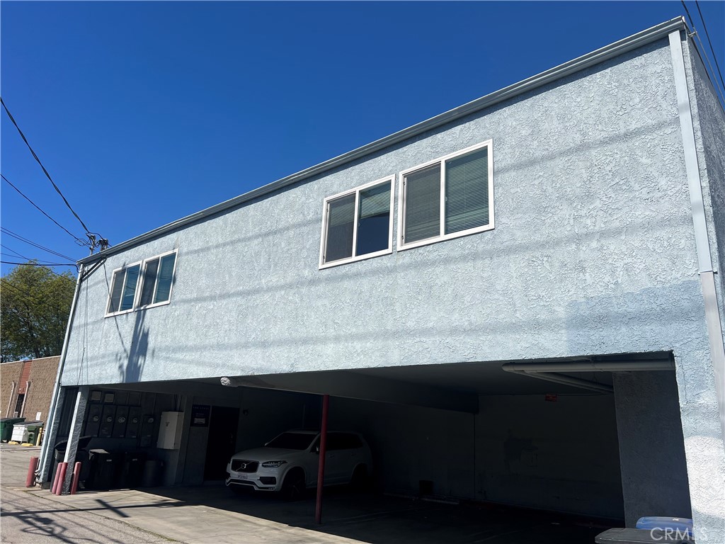 Upper Back Unit Off of Back Alley with Very Large Offices and has 2 Entrances and one (1) Carport Parking Space and lots of street parking. Windows on both the North and South side of the Building. Two (2) 1/2 baths that back up to each other and small Kitchen area with sink. Two (2) large offices have locked doors for additional privacy and one (1) office has 2 entrances. Very quite work space, all on the second floor. Have access 24 hours.