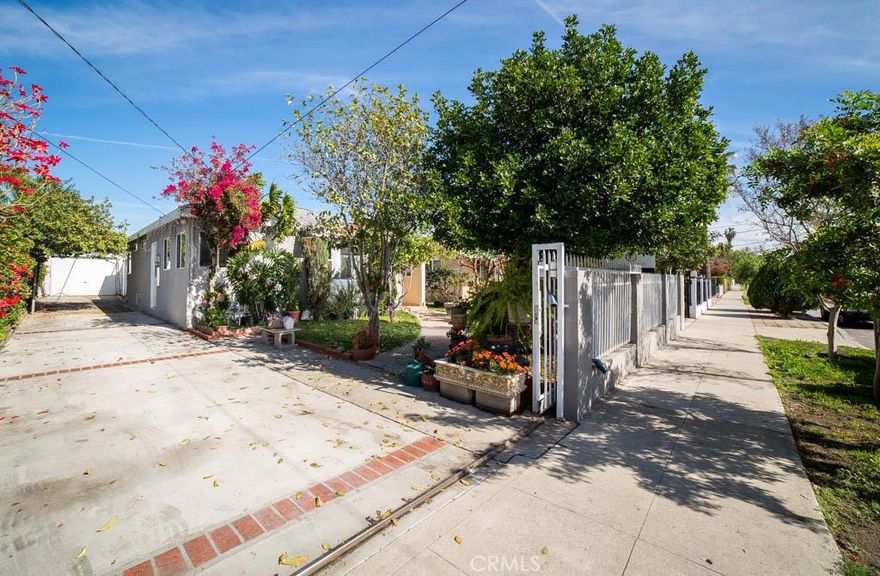 This beautiful home is nestled on a quiet tree-lined street in a great Sun Valley neighborhood and the owner has priced it to sell. Here are just a few of its many other fine features: <<It's lush lawn, majestic shade tree, brick planters with vibrant flowers, enhance its beautiful curb appeal "Move-In-Condition" with a striking designer paint >>The living room is bathed in natural light by a huge picture window and is further highlighted by hardwood Laminated flooring and recessed dual basin stainless steel sink, granite counters with striking tile floor, easy backyard access, plus the convenience of the adjoining formal ding room >Central heat & air for year-round comfort>>You're going to enjoy the backyard's mature landscaping, courtyard, >The 1 car detached garage With its oversized concrete driveway you'll have no problem securely parking all of your vehicles off street