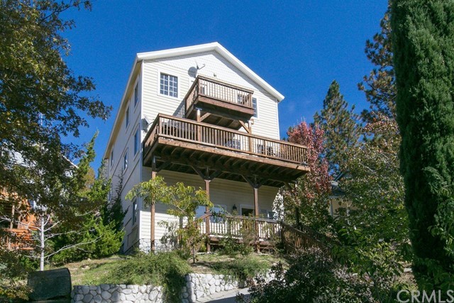 Open for backup offers. Updated and ready to enjoy. Some Lake views. Near Lake Gregory for hiking, fishing and fun!3 bedrooms and 2.5 baths. Updated kitchen countertops, cabinets and appliances. Large dining area and updated bathrooms. Large game room with pool table. Master with fireplace and living room with fireplace. Entertainment deck and fenced backyard. Over 2200 square feet makes this a great value. Come and see!