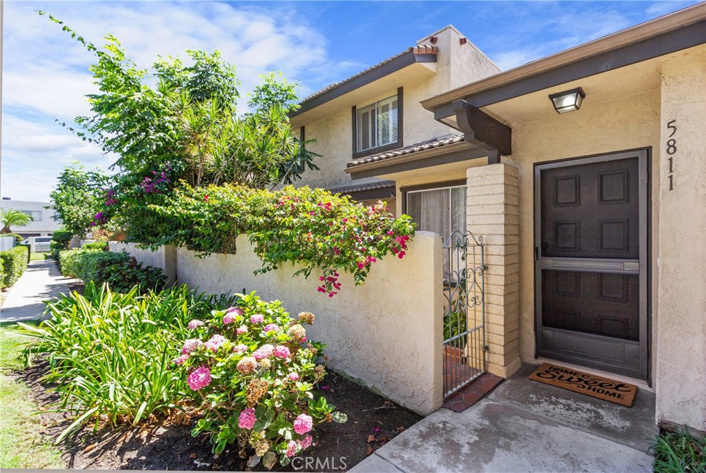 PRICE REDUCED! Welcome to 5811 Laguna Way, ideally located in the private gated community of Cypress Monterey. Soaring ceilings, beautiful laminate floors, and custom paint compliment the open and airy floorplan of this charming 3-bedroom townhome. Kitchen features white cabinets, granite countertops and a breakfast nook with access to the spacious patio, perfect for BBQs and entertaining guests. Inviting living room opens to the dining area, and convenient powder bath is also located on the main level. Upstairs, you’ll find the Master suite with double door entry, plush carpet, crown molding, plantation shutters, and mirrored closet doors. Large secondary bedrooms also feature plantation shutters and share the full hallway bathroom. Additional features include attached 2-car garage with laundry hook ups, plenty of storage space, and water softener system. Located near top-rated Cypress schools, shopping, dining, and parks. Enjoy the wonderful HOA amenities including 8 sparkling pools, spas & tennis courts.