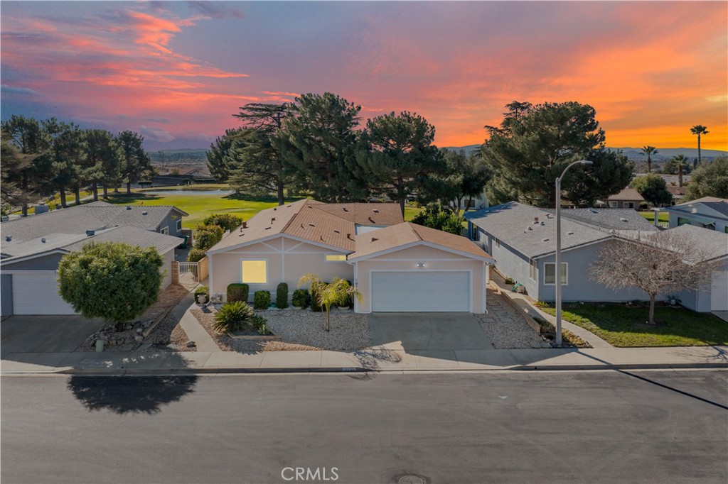 LOCATION, LOCATION, LOCATION!! Welcome to Highland Springs Country Club. This is an active 55+ GATED Community. The amenities include, FREE GOLF for residents and up to 5 of their friends can also play for FREE!! UNLIMITED FREE GOLF! In addition there are pickleball courts, tennis courts, a large clubhouse, pools, spas, and exercise area to name a few. This home is located right on the green! Your covered alumawood patio faces hole 1 on the golf course! If you are a golfer, look no more! Recently renovated with neutral carpet throughout,neutral paint throughout, freshly painted kitchen cabinets, with a water purifying system under sink, a new roof, new sewer line, new exterior paint, tons of windows with lots of natural light, view of the golf course, mountains, and water fountain near the clubhouse! This home has beautiful open lay out, large side yard with a covered alumawood patio, an orange and lemon tree! Lots of room to entertain, and BBQ on those warm summer nights! Guest bedroom has a sliding glass door that opens up to the patio. There is a 2 car garage, with a water softener, washer, dryer and fridge are included. Don't miss this opportunity to enjoy an active lifestyle in a great active adult community.. Did I mention the HOA is only $230 per month? You own your own land here, no space rent. This home is on a permanent foundation!