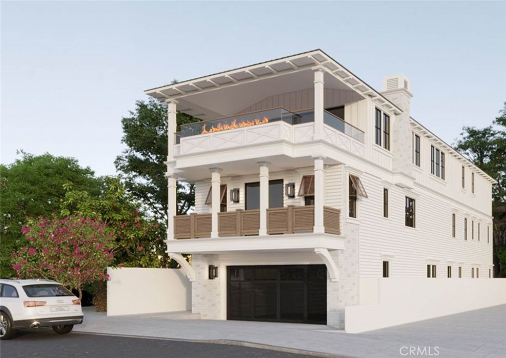 Welcome to 620 12th Street, a brand-new, five-bedroom, five-bath custom tri-level home that is cutting-edge coastal in style and Southern in hospitality. Offering 4600 square feet and characterized by natural materials such as stone, steel and wood, this home exudes both stylishness and warmth on every chic level. The entryway and first floor are inviting and polished, with oak and tile flooring, custom wainscoting and contemporary fixtures, creating an ambiance in the beach room, guest suite and extensive temperature-controlled wine room. A convenient mud room features built-ins and is adjacent to the spacious three-car garage, and a three-stop elevator provides easy access to all floors. The second floor is home to the primary suite, which includes custom wood wall treatments, a stone fireplace surround, tongue & groove ceiling and boasts a luxurious bath with stained wood paneling, marble floors and shower walls and industrial lighting. Two closets serve the primary suite, making year-round storage easily accessible. Three additional bedrooms – two joined by a Jack-and-Jill bath – as well as a laundry room are convenient to the second floor. The top floor is a showstopper and perfect for entertaining or enjoying cool views and breezes of the Pacific on the extravagant covered deck. The great room contains a custom stone fireplace with built-ins on either side and opens onto the veranda, while the neighboring dining area offers a formal place to host guests. The stunning kitchen includes statement tile, honed granite black countertops and a custom built-in casual eating nook. A walk-in pantry, powder room and private office grace the top floor as well. Located within a private, quiet neighborhood and sited within walking distance to downtown Manhattan Beach, the greenbelt and the Strand, this new construction leaves nothing to be desired.