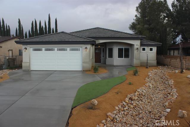 Gently lived in Spring Valley Lake home. Energy efficient contemporary four bedroom home with a great open floor plan.Three car tandem garage, drought tolerant front yard landscaping, solid surface counters, tile floors, high end finishes. Nice quiet street with newer homes around. Association Amenities: Beach, Marina # of RV Spaces: 0 Special Features: FS,,PTRY,PIER,LAKE,BEAC,MARN Lot Location Type: Standard Location Special Features: Garage Door Opener, Underground Util: # of Attached Spaces: 3 # of Detached Spaces: 0