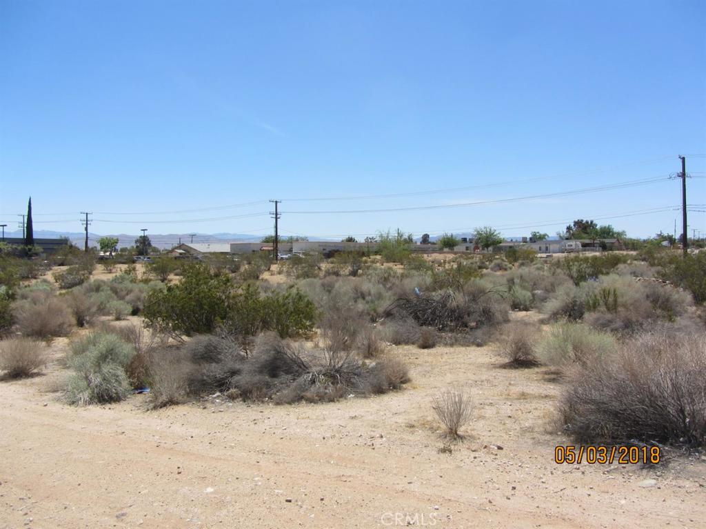 OWNER FINANCING AVAILABLE! Prime commercial location on heavily traveled Bear Valley Rd. Close to existing commercial development. Buyer to verify all potential uses and availability of utilities.