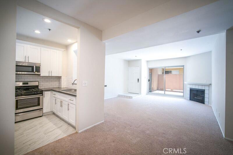 Come see this spacious unit located within the fantastic “Crossroads” complex in Inglewood. This unit features an open floorplan with a remodeled kitchen with quartz countertops and brand new stainless steel appliances, two spacious bedrooms with ample closet space, updated flooring, a fresh new paint scheme, a fireplace in the living room and two large bathrooms!! Within the complex you have full access to common area amenities like onsite security, 2 covered parking spots in the garage and access to the two beautiful outdoor pools and hot tubs! The location of the complex is amazing with shopping, freeways, and the new Inglewood football stadium all close by!! So come place an offer today because this unit is sure to sell FAST.