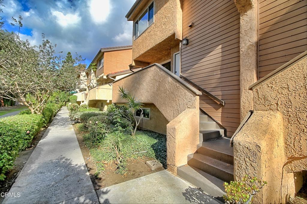 Excellent END UNIT condo for sale, this home is clean and move in ready! Tri level floorplan offering over 1600 square feet! Two bedrooms and 3.5 baths (two full baths upstairs, one half bath on living room level, one 3/4 bath downstairs), plus an extra den that could be used as a 3rd bedroom or office/yoga/art studio. Newer windows and tons of light, new plush carpeting, new paint, updated bathrooms and a fireplace. Primary suite includes a separate bathroom, spacious walk in closet, and an air filtration system. Private patio off of the entry provides a view to the nearby walking path and park-like trees. There is a full two car garage, with laundry hookups, and water softener. This community offers a pool, spa, and is close to the County Government Center, freeway access, shopping, restaurants, and schools. Just 4 miles away and a quick 10 minute drive to the beach! HOA fees include trash service. This is a great spot to call home.
