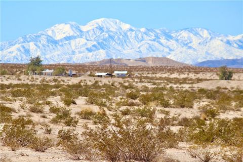 Photo of 5 Topaz Avenue, 29 Palms, CA 92277 (MLS # JT24130220) Photo of 5 Topaz Avenue, 29 Palms, CA 92277 (MLS # JT24130220)