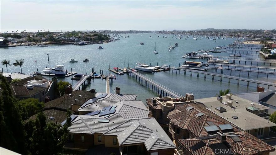 PLANS APPROVED FOR NEW 5,048 SOFT CONTEMPORARY HOME. Amazing views of the ocean, harbor, and city lights. Build your dream home here and have lots of equity. Theater room, bar, game room, pool, elevator, private roof top deck, office, and lots of decks to enjoy the view. Designed by famed local architect who thought of every detail. 3 car garage. Estimates are 2MM for construction, and home is valued at 10-12MM upon completion.