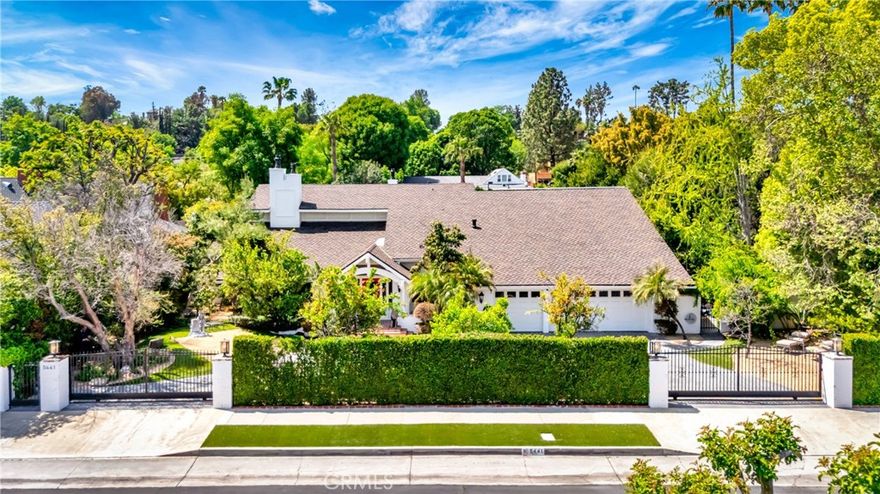 Gated and Remodeled Tennis Estate. Great Opportunity Tarzana South. Circular Driveway, Large Lot 23,329 SQ. FT.+5 BD+5.5 BA+ Guest House + North/South Lighted Tennis Court. Open Floor Plan w/Gorgeous New Kitchen, Huge Island, Two Dishwashers, Two Sinks. Two Laundry Rooms, Formal Dining, Living Room, Family Room w/Wet Bar and Fireplace. Aquarium Wall Between Family Room and Home Theater, Large Master Suite w/Two Separate Baths, Walking Closets and Steam Room. Sprawling Grounds w/Lawn, Flagstone Patios, Pool, Spa, Dry Souna, Putting Green, Firepit, BBQ, Vegetable Garden, Mature Fruit Trees, Solar System, Emergency Generator. OWC.