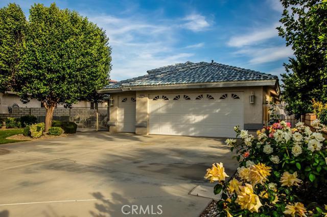 Enjoying life on North Lake on the shady side of the street and outdoor entertaining under the expansive covered patio, will be an everyday must. Open concept floor plan lends itself to indoor entertaining. Kitchen features Granite counter tops, double oven, gas cook top, microwave, compactor, long center island, pantry. Surround Sound, Fireplace, A/C + Evaporative, wide entry foyer. Solar tubes give natural lighting. Front courtyard has garden views. 3 bedrooms 2 baths, built in 2000. 2 car + golf cart garage with ladder to the attic for extra storage.Pictures tell 1,000s of word. Please take the picture tour. Association Amenities: Beach # of RV Spaces: 0 Special Features: CC,,POOL,CLUB,SPA,TENN,GYM,OSM,BEAC,GOLF Lot Location Type: On Lake Special Features: Garage Door Opener, Underground Util: # of Attached Spaces: 3 # of Detached Spaces: 0