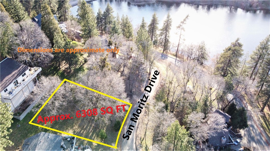 Fantastic lakeview lot just a stone's throw from beautiful Lake Gregory! Located in the popular San Moritz area with beautiful custom homes all around. Approx. 85 FT of street frontage on San Moritz Drive. All utilities (water,gas,electric,sewer,cable,phone,internet) conveniently located at or near the street. Lot is over 6,300 SQ FT with big beautiful pines, cedars and oaks all around. Lake Gregory access is just around the corner with fishing, swimming, boating, water activities, water slide, beach areas, hiking trails and more! No HOA, no Mello Roos. Airbnb/vacation rentals with lakeviews are super popular around Lake Gregory, renting for as much at $2,000 per night for a great potential income stream. Don't miss this unique opportunity to own one of the last great lakeview lots...make your offer today!