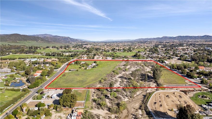Great location near the down town area of Murrieta California on 33.75 acres of land. This is a beautiful piece of gentle sloping land. Great views from all around! Sellers have own the property for years. This is a once in a life time opportunity to own this type of large acreage. Includes one conventional built home with 3 bedrooms and 1 3/4 baths and a 2 car garage with approx. 1410 square feet (buyer to verify). And one triple wide manufactured home with 3 bedrooms and 2 bathrooms approx. 1920 square feet (buyer to verify) . Includes 2 wells. Property is fenced in certain areas of the property. Several other outbuilding for possible storage or horses? This property is a must see!