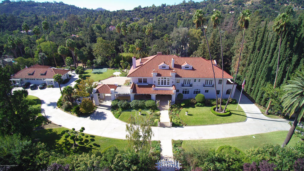 The Crown Jewel Estate of La Canada Flintridge and Pasadena Showcase House for 2016, this magnificent home is believed to have been designed by noted architect Myron Hunt for Senator Flint. Originally known as the Dryborough Estate, the home was used in the 1976 movie W.C. Fields and Me was also the Pasadena Showcase house in 1987. The estate was renovated and updated recently on one of the most prestigious streets in La Canada Flintridge, the Mission Revival Mansion is surrounded by just under 2 acres of lush grounds, made up of three separate parcels, with the main house features four levels totaling 16,155 square feet (taped) with an elevator going through all levels. The separate guest house sits on its own parcel and 2023 SQ FT of living space