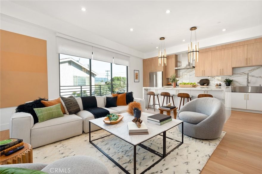 Welcome to 11026 Oxnard St, North Hollywood, CA 91606 – where modern luxury meets urban convenience! This triplex embodies the epitome of contemporary living, boasting three meticulously crafted units designed for the discerning individual or family seeking both style and functionality.

Each of the first two units offers a spacious layout with 3 bedrooms and 3.5 bathrooms sprawled across approximately 1700 square feet of sleek, sophisticated living space. The third unit, spanning approximately 2000 square feet, features 3 bedrooms, 3 bathrooms, and 2 half baths – totaling 5 bathrooms to accommodate every need.Elevating the living experience to new heights, these units are a testament to modern design with a tri-level townhome style configuration. Enjoy the convenience of a private attached garage at floor level, ensuring seamless access to your urban oasis. But the real pièce de résistance? The rooftop sky deck accompanying each unit, offering panoramic views of the vibrant North Hollywood skyline – perfect for entertaining or soaking up the California sun in style.Designed with versatility in mind, these units cater to a myriad of lifestyles, making them ideal for large families, roommate living arrangements, or co-habitation setups. Students will appreciate the proximity to educational institutions, while young professionals will find solace in the contemporary amenities and strategic location.Nestled just a stone's throw away from NoHo West, the premier regional shopping mall and mixed-use development, residents will find themselves immersed in a dynamic community teeming with pedestrian-friendly shops, restaurants, and entertainment options. Additionally, the nearby North Hollywood Metro Station Development offers seamless connectivity to the greater Los Angeles area, making commuting a breeze for tenants on the go.Don't miss your chance to experience the pinnacle of modern living in the heart of North Hollywood. Schedule a viewing today and prepare to elevate your lifestyle to extraordinary heights at 11026 Oxnard St.