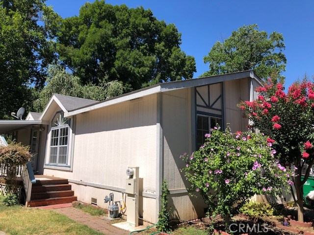 Fresh paint and new flooring throughout make this large 3 bedroom two bath mobile shine! Nice decks on both front and back. Vaulted ceilings, light and bright, with spacious rooms. Quiet spot in the park for privacy. This one is a pleasure to show! Park has frequent social events. Access to community pool and rec room. Hurry! (The information contained herein has been obtained through sources deemed reliable but cannot be guaranteed as to its accuracy. Sq. ft., bed/baths , & lot size taken from public records. Buyer is advised to investigate to their satisfaction.)