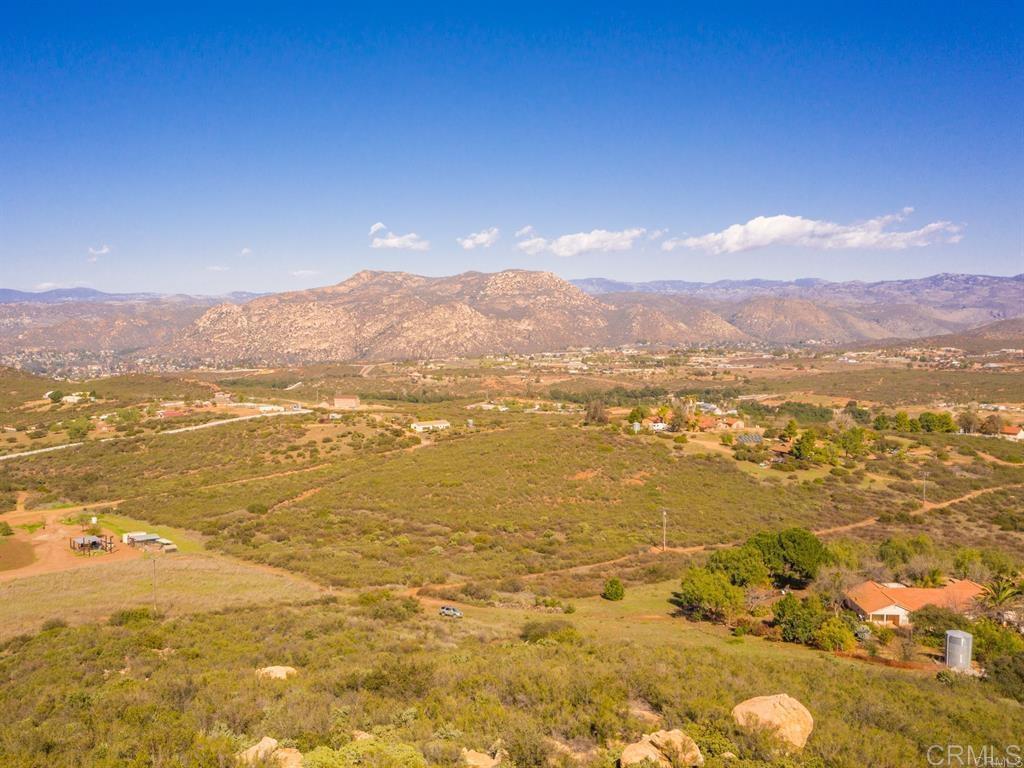 10 acre Ramona property just outside of San Diego Country Estates. Surrounded by valleys and mountains this property features views all around from sunrise to the sunset. Some rough grading has been completed with a potential building site, power is to the edge of the property, and there is an existing well for water.