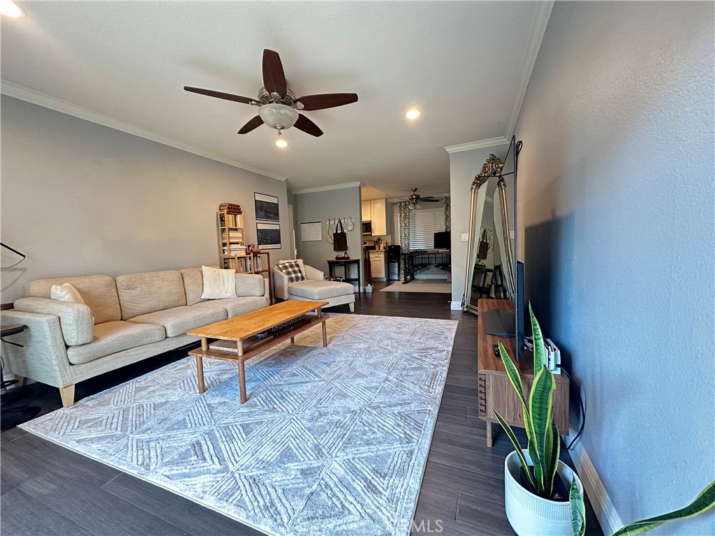 Coastal comfort meets modern style in this beautifully refreshed ground-floor condo at Villa Warner. Step outside to your private patio, perfect for sunny afternoons, and enjoy a complete interior remodel featuring sleek finishes and thoughtful updates. Community perks include a pool, fitness center, and more, all within easy reach of Huntington Beach's vibrant scene.