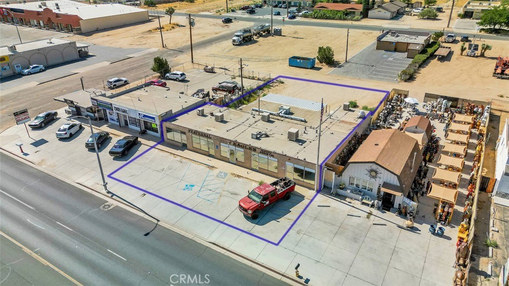 Attention Investors and Owner-Users! For Sale: Multi-Tenant Commercial Building ideal for Retail or Office use. This versatile ±2,700 sq. ft. commercial property can be utilized as a single large suite or subdivided into multiple suites to maximize rental income. Located on highly traveled Main St., with over 37,000 cars passing by daily, offering exceptional visibility and high traffic exposure for any business. Land at the rear, provides potential to add extra parking. Don’t miss out on this prime location with excellent exposure and growth potential!