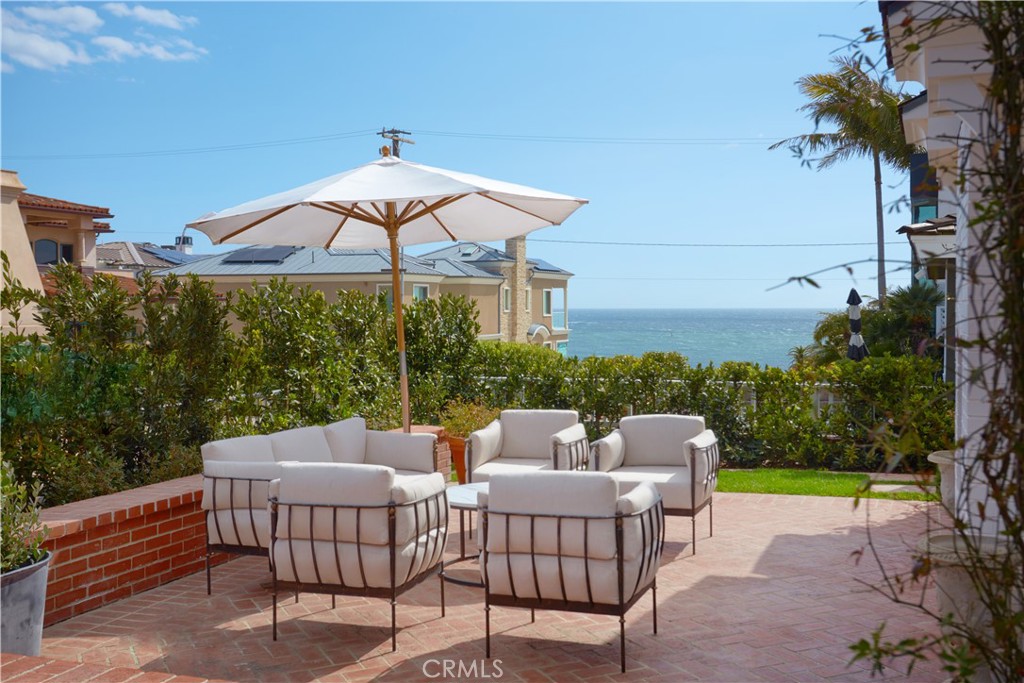 Flawlessly reimagined to the height of perfection in the heart of Corona del Mar, this exceptional double-lot estate boasts breathtaking ocean, harbor, and Catalina views. An impressive Cape-Cod style exterior commands approximately 60 feet of frontage and encases an elegant floor plan of six bedrooms and six-and-one-half bathrooms in approximately 5,954 square feet of living space.
