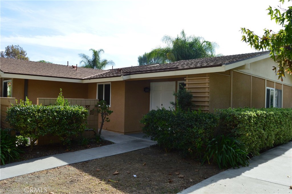 Completely remodeled GRANDA floor plan in the 55+ gated senior community of Laguna Woods Village. The owner has spared no expense on remodeling this beautiful unit. Step into the spacious light filled main living area with vaulted ceilings and private open sun filled atrium. Just off the living area is a kitchen that will delight any cook. Featuring: new cabinets, corian countertops, designer backsplash and all new stainless steel appliances including stove and refrigerator. Indoor laundry with new stacked washer and dryer. New windows throughout, new interior doors, new laminate wood flooring, recessed lighting and new air conditioning unit. The two bathrooms have also been impeccably remodeled with designer touches. Laguna Woods Village is centrally located near shopping, hospitals, entertainment, shopping malls and the one and only Laguna Beach. The village offers 7 clubhouses, 5 pools, gyms, horse stables, tennis courts and a 27 hole golf course. This is retirement living at its best. Hurry this renovated Granada plan will not last!