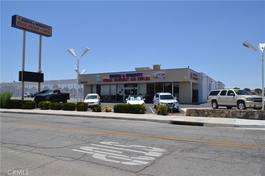 LOCATION! LOCATION! LOCATION! Excellent Commercial Building FOR SALE previously Victorville Motors & Chrysler, Dodge, Jeep dealer, located off of 15 freeway on 7th Street in Victorville. Freeway visibility and near all major businesses, right next to Costco. Building square footage is almost 12,000 SF of living space which includes a spacious showroom with sales offices, a conference room, a warehouse or storage, a male and female bathroom, a service bathroom, and a service area. Almost 2 acre corner lot all asphalt. Also includes a used car lot section. Located in Civic Center Commercial Zone of Victorville. Owner operated business currently occupying but can be delivered vacant