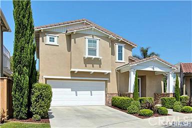 Beautifully upgraded model perfect home in quiet Cul De Sac location with long drive way. Downstairs with open floor plan,tile flooring throughout,spacious family room with vaulted ceiling open to dining area and kitchen. Gourmet kitchen with granite counter top, upgraded cabinetry,stainless steel appliances(refrigerator included),wine bar and more! extra wide counter top is perfect for eating bar. Upstairs with wood flooring and all bathrooms remodeled with custom tile / granite counter top. you will enjoy looking out to hardscaped lovely backyard,all around sunny and bright home! Walking distance to most sought-after elementary, Soka University,parks and trails. Close to shopping and 73 Toll road.