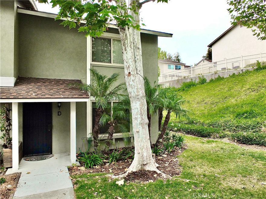 Welcome to your charming Anaheim retreat! This inviting townhome offers the perfect blend of comfort and convenience and is an end unit in the coziest part of the neighborhood. This home hits all the right notes, starting with an inviting living room, leading to a dining room adjacent to the kitchen and brightened by the large fenced patio that provides both light and a view of whatever lovely things you might fill the patio with. The kitchen features fresh white cabinets, granite countertops, stainless steel appliances, and a convenient walk-in pantry that doubles as a laundry room. 

  Upstairs, you'll find the three bedrooms, each featuring a ceiling fan. These bedrooms share a full hall bathroom, with direct private access from the larger primary bedroom.

  Outside, the spacious patio provides a serene oasis, fenced in durable and zero-maintenance concrete sheet paneling, backing to a green hillside for added privacy. Enjoy the outdoors and soak in the California sunshine in this peaceful setting.

  Additional features include a private one-car garage with storage and an additional parking space next to the patio, providing ample parking options. Residents of this community also have access to a nearby pool and spa, lush green belts, and an award-winning school district, making it an ideal place to call home.

  Don't miss out on this opportunity to own a piece of Anaheim paradise! FHA approved complex. Schedule your showing today before it's gone!