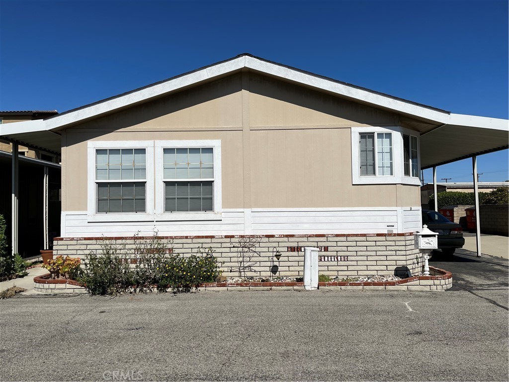 This is a rare opportunity to own a home in the Vera Carson Mobile Home Park, a highly sought-after 55 and over community where there has been only ONE other sale in 2022! This home is centrally located with quick access to many major freeways (405, 110, 710, 91) and close to the best shopping, eating, and entertainment in the South Bay (Manhattan Beach, Hermosa Beach, Torrance) and Long Beach! Start your day at the Aquarium of the Pacific or the Queen Mary in Long Beach, and then head over to the South Bay for great food and shopping! The home itself is amazingly spacious and bright with a semi-open floor concept in the living area. The primary bedroom is expansive with a full en suite bathroom and a walk-in closet. The second bedroom is roomy and boasts its own walk-in closet. This home also includes a large office which allows maximum privacy for those who work from home. When you buy this home, you don’t even have to worry about purchasing appliances as it will come with a counter-depth refrigerator, dishwasher, range, washer, and dryer! It is a true turn-key home! (Family members who are 18 and over are allowed to reside in Vera Carson.)