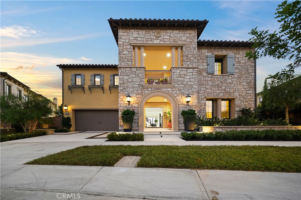 Beautiful property nestled atop the picturesque orchard grove, this exquisite "Cielo Residence" at Bella Vista presents a lifestyle of opulence and desire within the esteemed guard-gated community of Groves at Orchard Hills.