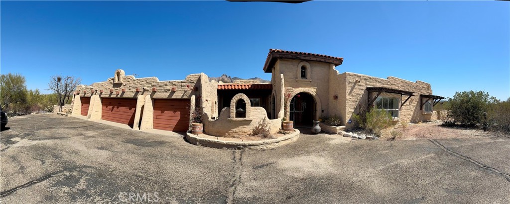 ATTENTION INVESTORS OR CASH BUYERS IN CATALINA FOOTHILL ESTATES. Exquisite 5439 Sqft estate. Main home is 3724 sqft with 3 bedrooms 4 bathrooms, an atrium, large open living room with rock fireplace, formal dining, family room, large master suite, Indoor swimming pool, 4 car garage with 2 large storage rooms, cozy courtyards, rounded driveway. In Addition, there is a large 1700 sqft guest home that has 2 large bedrooms each with their own private bathrooms, a family with fireplace, and kitchen. This is truly a unique home with exceptional possibilities. The exterior has panoramic views on over an acre of land. Located near the La Encantada Mall where you will find fine dining and upscale shopping. Modern renovations will make this home an absolute Gem!