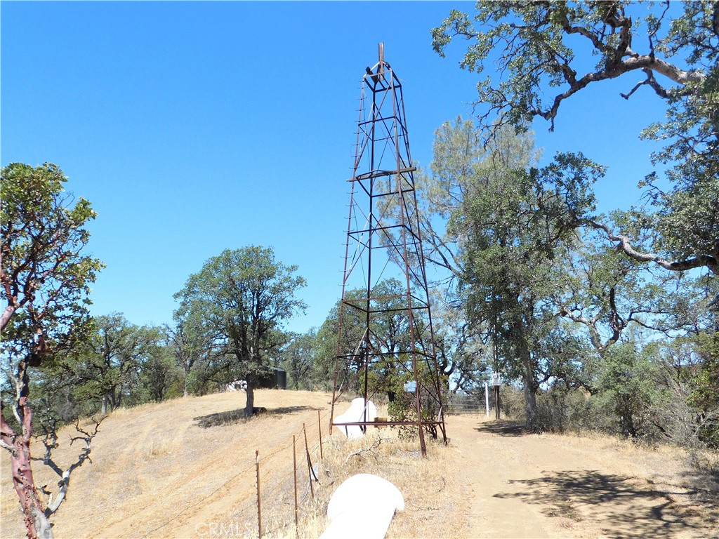 Almost 6 acres of gorgeous land with lake and mountain views. Property has a very strong water-well with great water pressure. PGE on property, storage shed, fenced in garden/crop area. Secluded slice of paradise ready to build your dream home/ranch on.