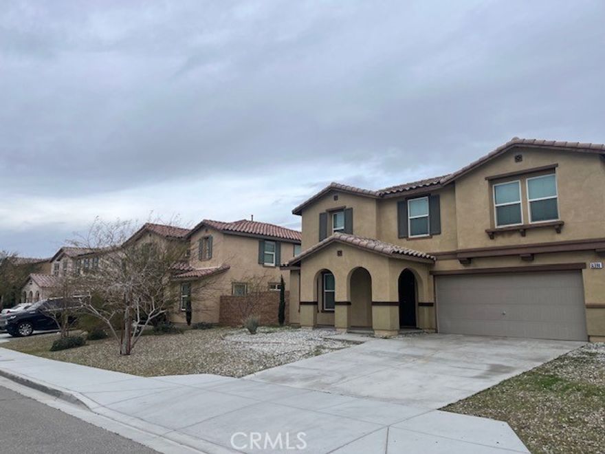 This stunning home boasts impressive curb appeal. With five bedrooms and three full bathrooms, this gorgeous residence includes a loft on the second floor that could potentially be converted into a 6th bedroom (subject to city approval). The large loft is also for family functions. The laundry is upstairs. One bedroom and one full bathroom are conveniently located downstairs. The bright, open floor plan encompasses a vast living space spanning 2,472 sq ft, set on a generous 7,200 sq ft lot. Ideally, it is in a prime location in Victorville, close to schools, shopping centers, and all amenities. Don't miss the opportunity.