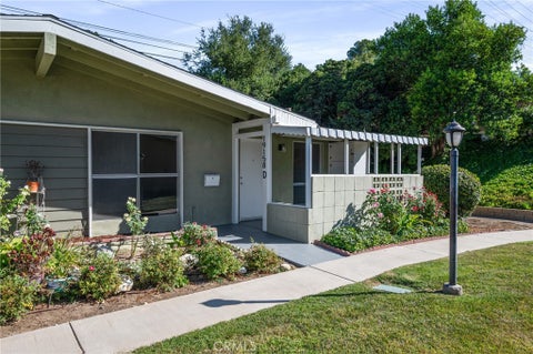 Photo of 19158 Avenue Of The Oaks #D, Newhall, CA 91321 (MLS # PV24172757)
