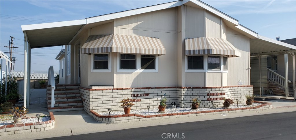 #164 is 2001 ADA UNIT with WHEEL CHAIR LIFT & WALK-IN TUB/SHOWER in Master Bathroom. Large Kitchen with Island. Beautiful Living Room with Raised Ceilings and lots of natural light from Dual Pane Windows. 1560 sqft - 2 BED-2 BATH + DEN (3rd bedroom?) Silvercrest READY TO MOVE IN ASAP!! COVERED 3 VEHICLE CARPORT With Expensive Privacy Screens and Large Shed. This home boasts a Lovely Fireplace in the Living Room and a great Open Floor plan. Spacious Separate Laundry Room. Guest Bedroom is so large it has 2 entrances. Large Master Suite with WALKIN CLOSET, Walk-in Tub between his and her separate vanities along with additional shower on one side. Lot is easy maintenance with a Fruit Tree. ALL Reasonable Offers will be Reviewed. LENDER FINANCING AVAILABLE FOR BUYERS!! Park has many amenities pool, 2 spas, 2 full size lighted tennis courts, a billiard room, clubhouse and a large common area recreation hall for park events. One owner must be 55 years old and have the monthly income of $3300. Additional family members can live here but no one under the age of 18 can live here full time. Room mates acceptable. Buyer to verify all information to Buyer's Satisfaction.