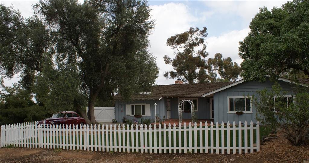 Older custom home in very desirable location with that country feel and atmosphere, just a couple minutes from shopping and freeway access. Wood Floors and new carpet, fresh paint, brick fireplace, dual pane vinyl windows and patio doors, new sod and sprinklers front and rear. Majestic olive tree greets you as you walk up curving pathway to entry... Classic board and bat as well as stucco siding. Full 1/2 acre of land level to gently sloping. Neighborhoods: Orleavo Heights Equipment: Dryer,Garage Door Opener, Range/Oven, Shed(s), Washer Other Fees: 0 Sewer: Sewer Connected Topography: LL,RSLP,GSL