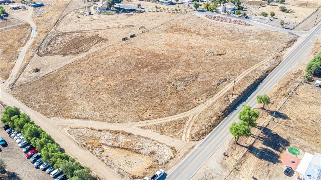 Here is your chance to build your dream ranch home in a growing area of Menifee & Winchester. This property is just over 4 acres with electric at the street and a well already located on the property. Property is zoned R-R so bring your horses and farm animals. The lot is flat with a small rolling hill. Just about 3 miles from I-215 and close to Winchester Road. (Buyer to verify the zoning and perform due diligence )