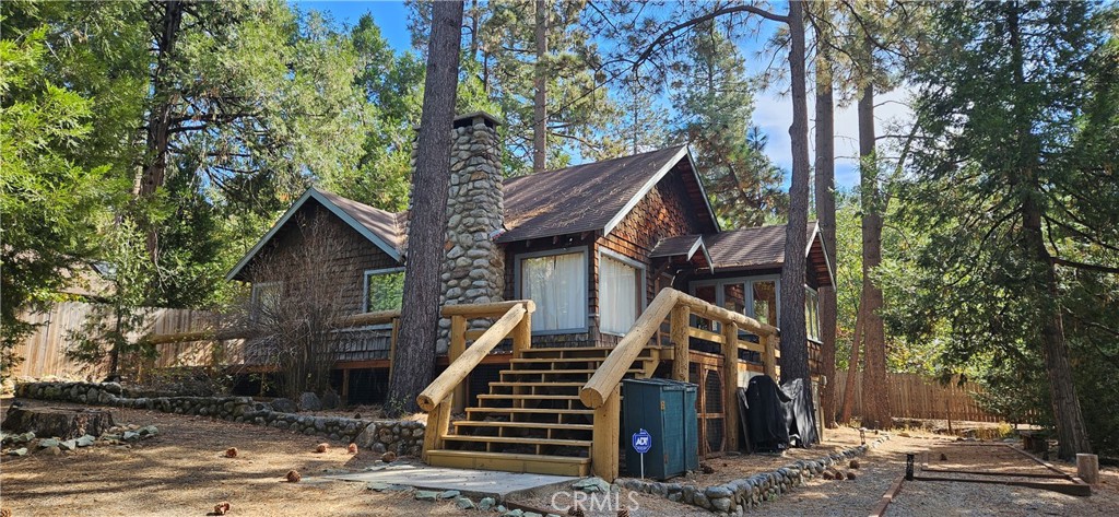 Fully Furnished two bedroom, two bathroom home centrally located in Idyllwild. Hardwood and tile flooring throughout. The living room offers high ceilings with ample natural light, a river stone fireplace, and pull-out couch bed. Master en suite with full bathroom. The second bedroom and master are separated by a hall .75 bathroom. You can find access to the sun room via the kitchen and master en suite. Large front and back decks with a hot tub located on the back deck. There is a season stream that runs through the yard with a bridge with access to a picnic table for those nice meals outdoor after a long day. Central heat and A/C throughout. ***Available April 1, 2025 for medium term rentals only (>30 Days)*** $150 cleaning fee. $500 refundable deposit. $250 refundable pet deposit (if applicable).