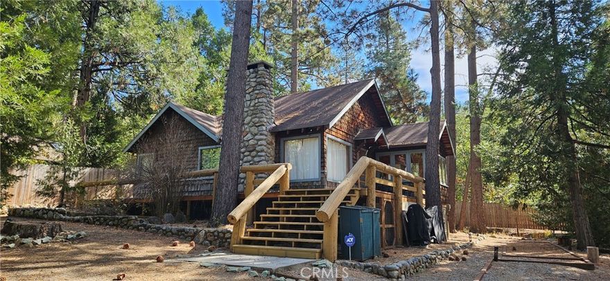Fully Furnished two bedroom, two bathroom home centrally located in Idyllwild. Hardwood and tile flooring throughout. The living room offers high ceilings with ample natural light, a river stone fireplace, and pull-out couch bed. Master en suite with full bathroom. The second bedroom and master are separated by a hall .75 bathroom. You can find access to the sun room via the kitchen and master en suite. Large front and back decks with a hot tub located on the back deck. There is a season stream that runs through the yard with a bridge with access to a picnic table for those nice meals outdoor after a long day. Central heat and A/C throughout.  ***Available April 1, 2025 for medium term rentals only (>30 Days)*** $150 cleaning fee.  $500 refundable deposit.  $250 refundable pet deposit (if applicable).