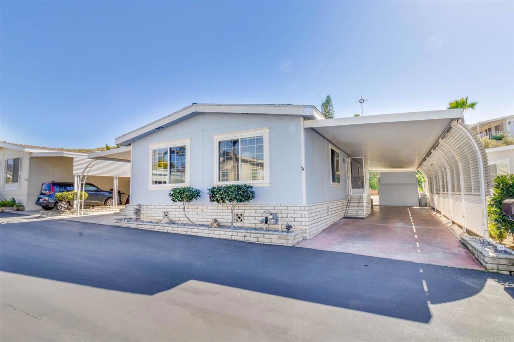 Turn Key Ready Inside & Out! Sellers Are Ready to Move! Price Adjustment Made to Review Highest & Best Offer (Range Considered will be from $350,000 thru $375,000.) Best Offer has yet to be Accepted so Call to Preview this lovely home. Renovations and Remodeling Inside & Out (2018-2021) Property and Lot Features:(BUT Not limited to this short summary) 1740 sqft, 3 Bedroom, 2 Full Bathrooms, Freshly Painted, Newly Updated Flooring, Double Pane Windows, Reverse Osmosis Water System, French Doors, Newer Furnace, Water Heater, Sinks, Refrigerator, Dishwasher, Faucets, Cabinets & Textured Walls. Modern Gourmet Kitchen with Stainless Steel Appliances, Wine Cooler Area & a designated section with a free standing freezer and Pantry (wall pantry with pull out drawers.) The tasteful Details & Remodeling are simply too numerous to List here so Set up your Private Showing to Personally Preview Home. It has received an Extensive Makeover & is ready for the most selective New Owners. Membership to Rancho Monserate & Country Club allows for all residents to enjoy Golfing, Swimming (Heated Pool & Spa) Tennis, Dog Park & RV Storage. This lovely Home is on a Permanent Foundation so has 433A status on OWNED LAND & therefore makes it very attractive for many financing options. This Reputable & Well Established 55+ Retirement & Resort Community is just minutes away from the 76, I-15 & Old Highway 395. These major highways allow easy access to all popular destinations; such as Temecula Wineries, Historic Fallbrook, Oceanside & Carlsbad Beaches, Pier & Marina, & well recognized dining options. Ideally located to numerous activities and destinations that are a part of San Diego County. This quiet retirement and resort community is surrounded by a beautiful countryside setting with breathtaking views that many residents have called their community and home for over 30+ years. YOU could be Next! Don't Miss your Opportunity to Own in Rancho Monserate Country Club! Set up your private appointment before it is too late.
