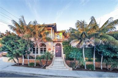Manhattan Beach Hill Section Living at its best, light fixer. Own your own block with the only property the boarders 3 streets. Enter through a secure gate, to a private courtyard with swimming pool, Jacuzzi, BBQ, outdoor fireplace and seating area. Dramatic 2 story entry with limestone floors and custom ceilings throughout. Living room with coffered cielings, formal dining room with crown molding, huge family kitchen with top of the line appliances, Butlers Pantry,granite counters, breakfast bar,, laundry room, 3 car garage with 3 additional spots in the driveway. Gorgeous wood beam ceilings and Lutron lighting system throughout. Downstairs "basement" boasts your choice of playroom, gym or theatre complete with a 500 bottle wine cellar. All 5 bedrooms upstairs. The Master Suite offers large sitting room, double fireplace, breakfast bar, huge walk in closet, heated marble floors and fabulous views. Top floor offers a Billiards/upstairs family room with wet bar, fireplace and views. This is a terrific family home within walking distance of downtown Manhattan Beach restaurants and shopping. Make this your home and take advantage of the beach and Manhattan Beach's award winning schools