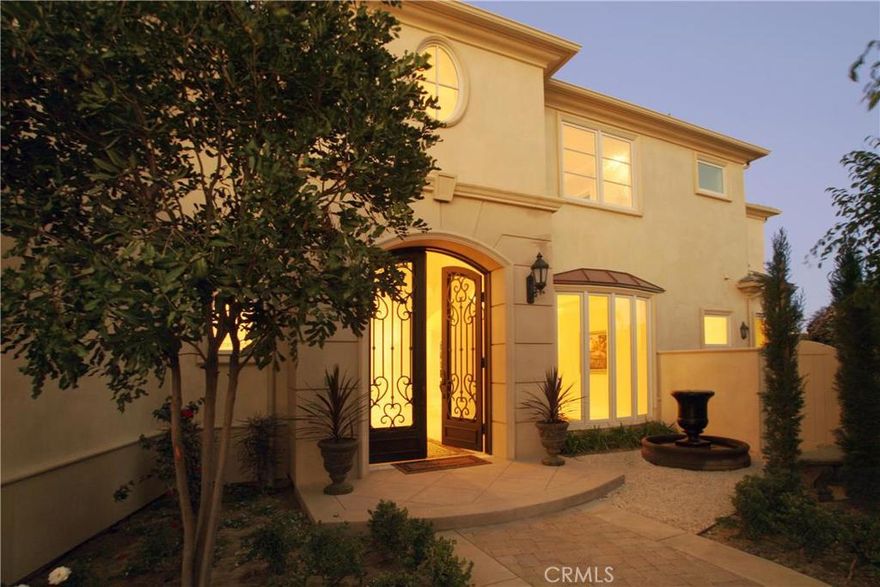 Chateau on the Bay. Huntington Harbour's premiere estate. Classic French Mediterranean architecture, once in a lifetime main channel point location with tri-channel views, great room floor plan, 6 bedrooms, 6 baths, downstairs guest bedroom, upstairs large waterfront bonus room, French style goumet kitchen adjoins waterfront great room, water views from the library/home office, 3 interior fireplaces, elevator, 130 feet of water frontage with 70 foot travertine cantilevered deck, waterfont spa overlooks bay, 3 car garage, beautifully landscaped entry courtyard, waterfront outdoor living area with fireplace, cul de sac location. Another stunning waterfront home built by Harbour Bay Homes Development, Jim Caldwell.